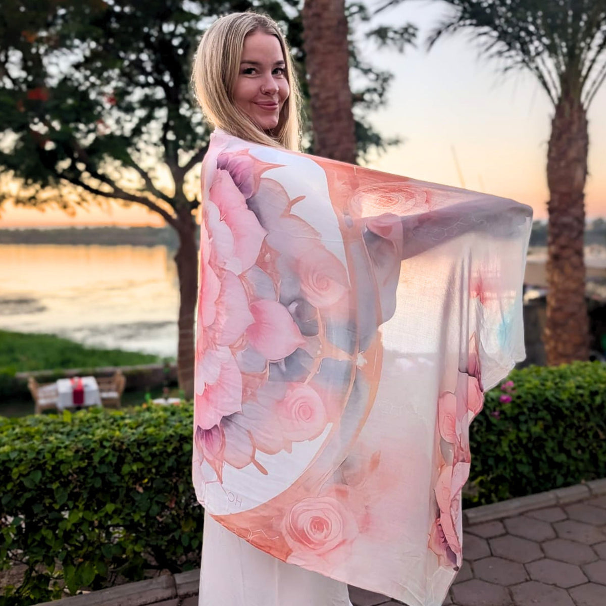 Back view of the Bliss Shawl held open showing the pink rose mandala design - boho ceremonial wrap