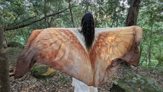 Abundance Shawl in gold and cream, an oversized bohemian wrap with angel wing artwork, a spiritual gift for women