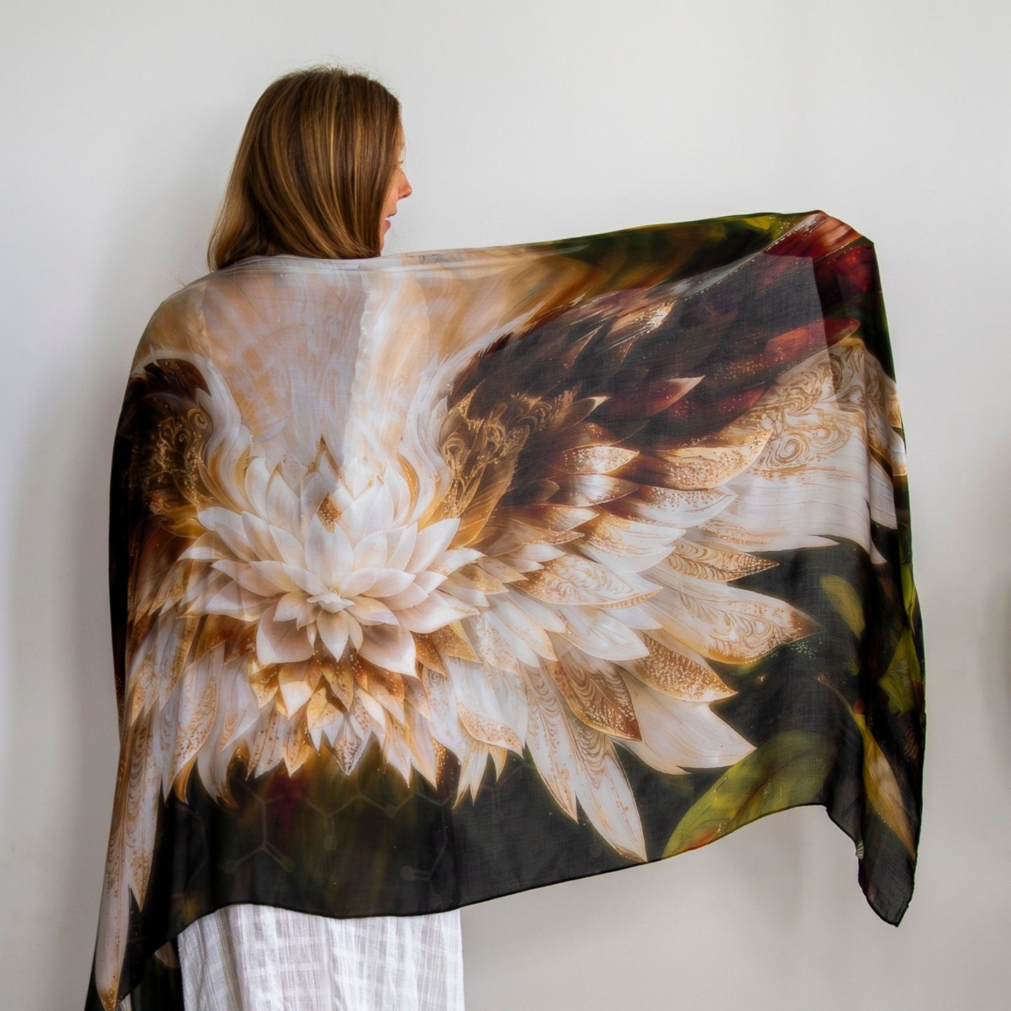 Full view of the Grounded Presence Shawl featuring angel wings, white lotus artwork and wearable wellness design
