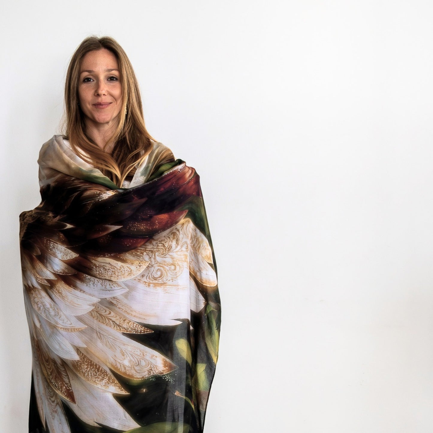 Grounded Presence Shawl worn as a meditation shawl featuring angel wings and white lotus artwork