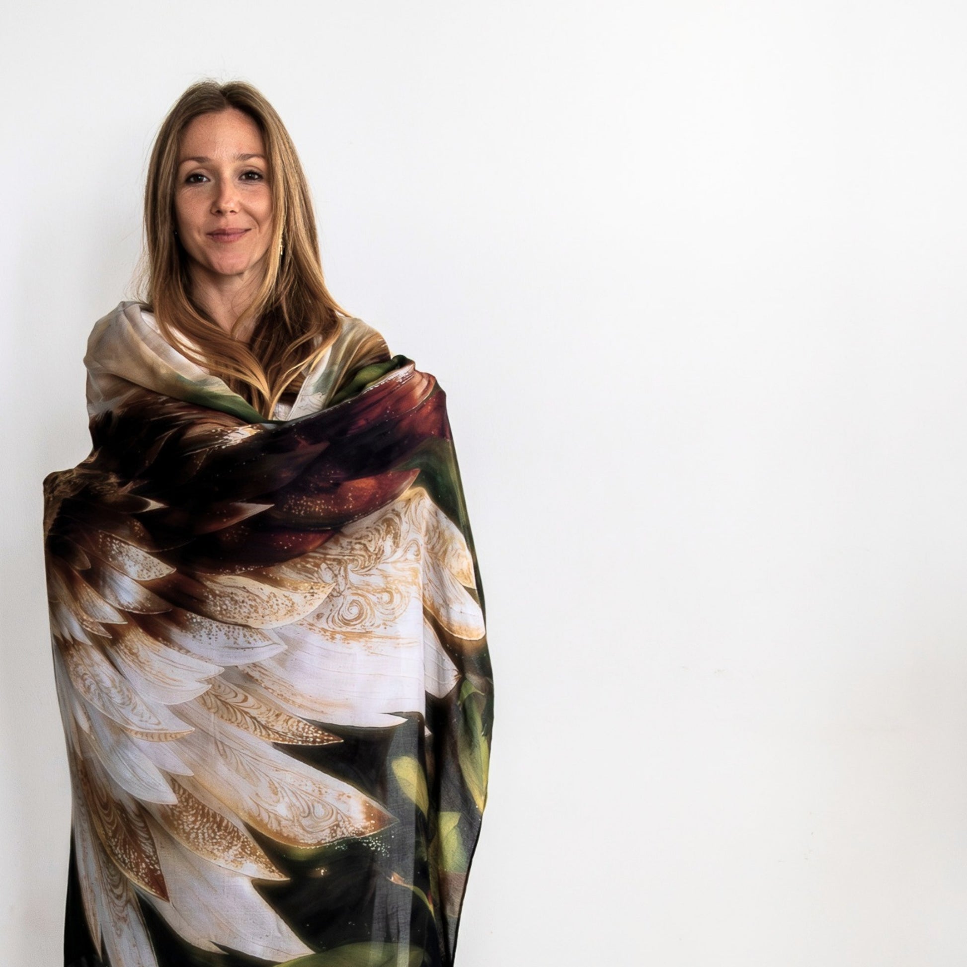 Grounded Presence Shawl worn as a meditation shawl featuring angel wings and white lotus artwork