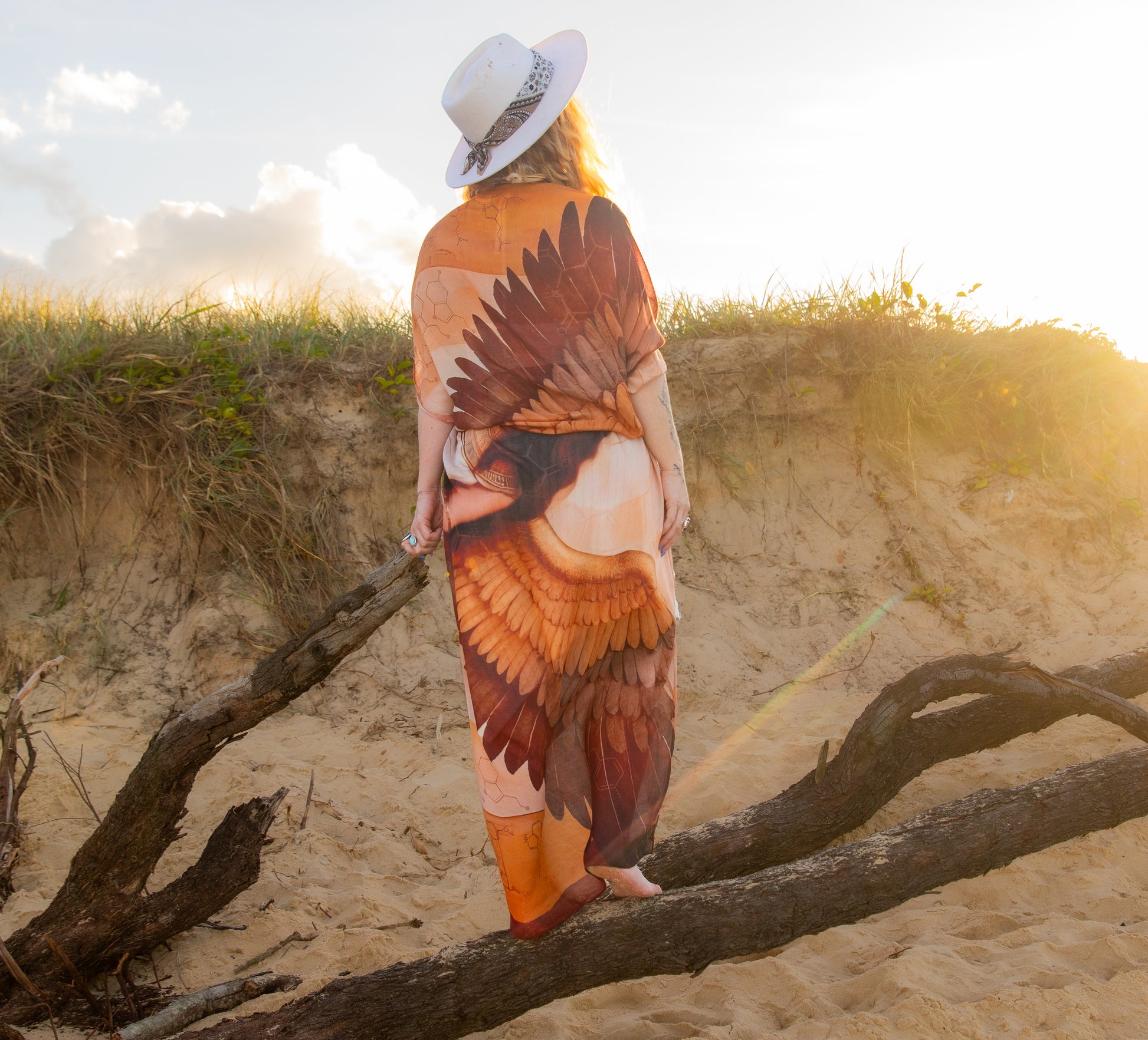 Divine Feminine Shawl draped as a healing shawl and ceremonial wrap, Egyptian inspired winged design