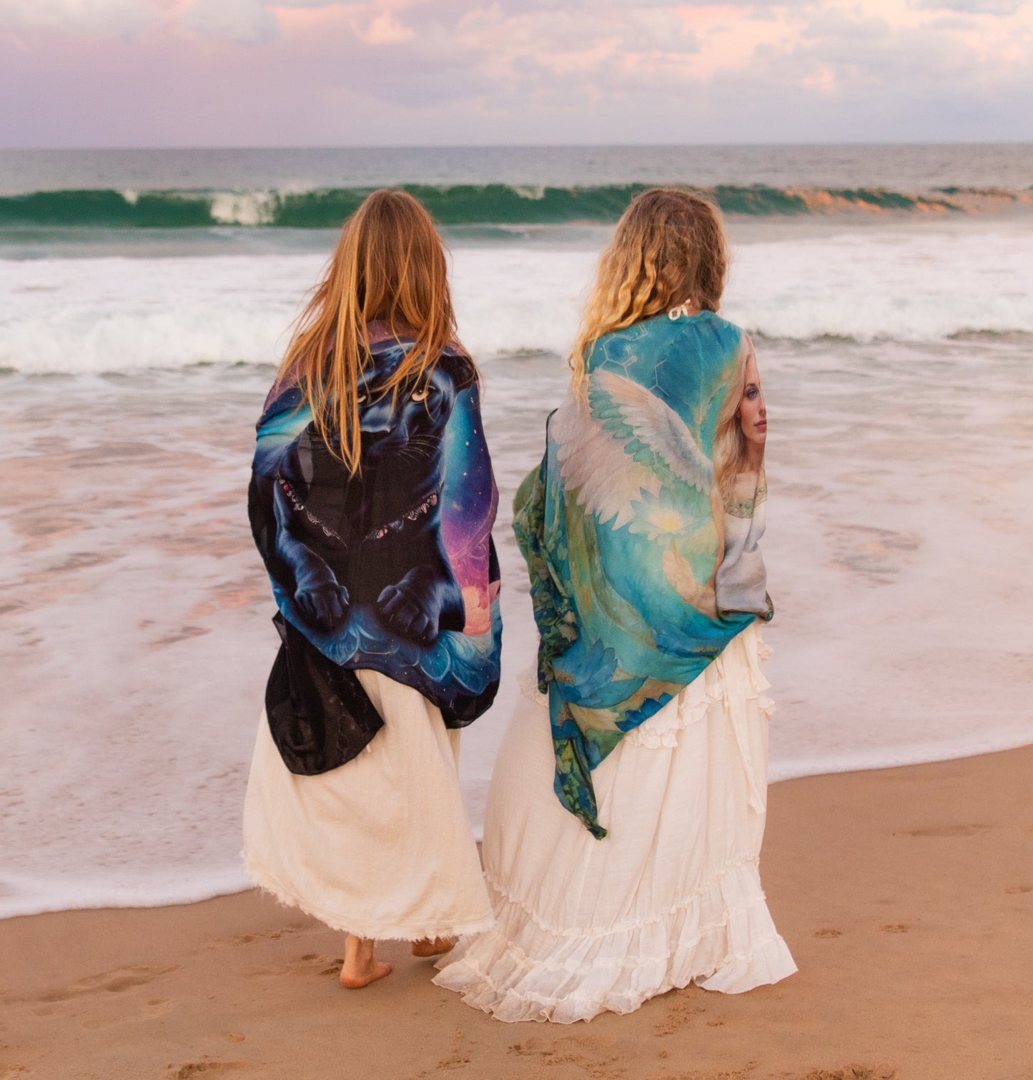 Confidence Shawl worn as resort wear, an oversized scarf with black panther goddess inspired design