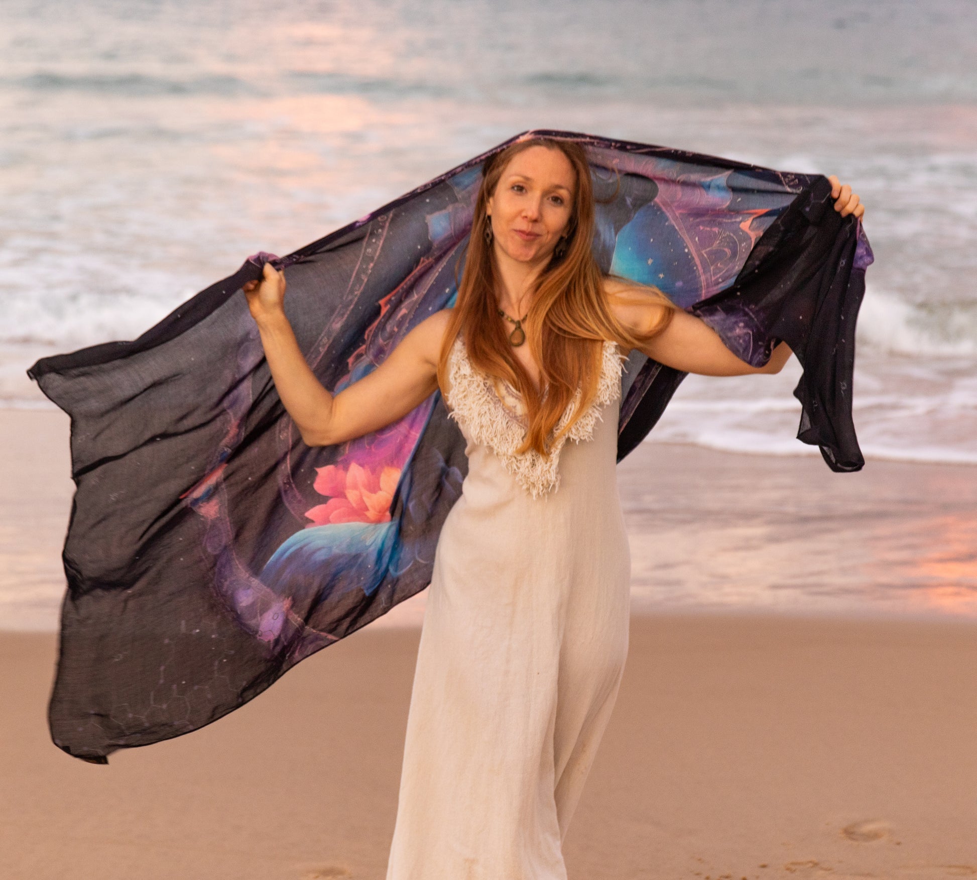 Woman wearing the Confidence Shawl as festival clothing, vegan silk shawl with panther mandala artwork